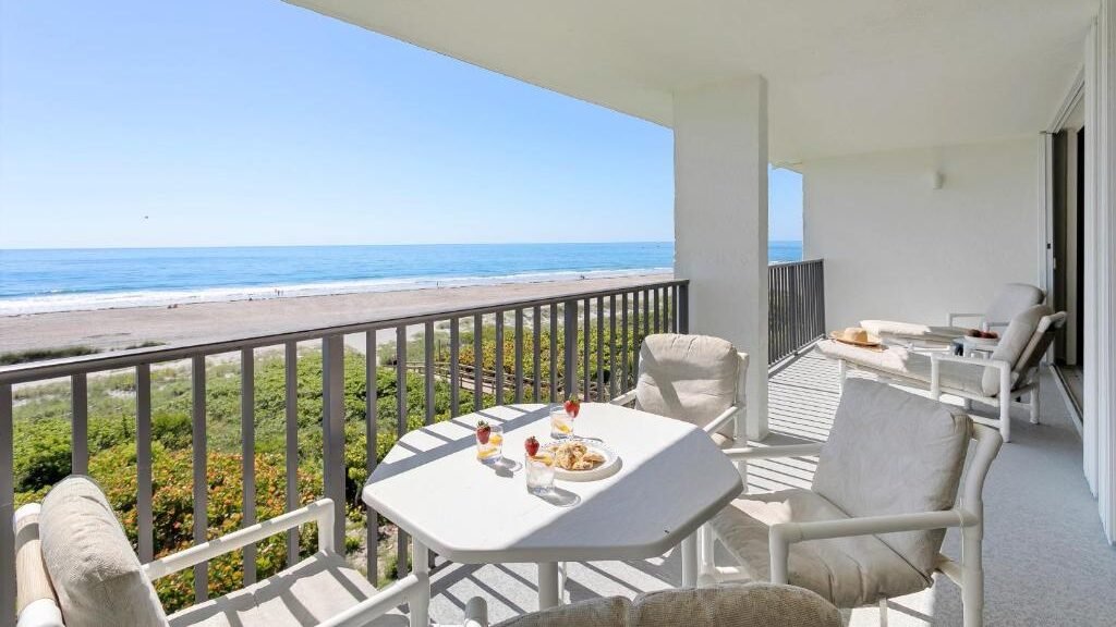 beach view from balcony of Cape Winds Resort